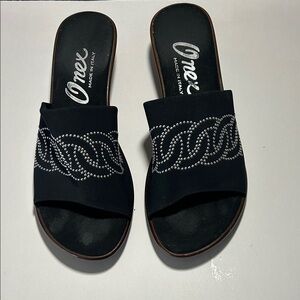 Onex Rory black wedge slide sandal with silver stud detailing